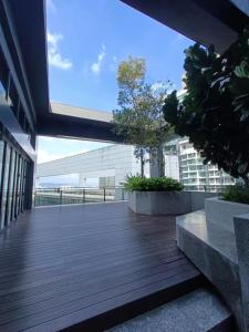 a balcony with a view of a building at Viia@Eco kl city#Mid Velly in Kuala Lumpur