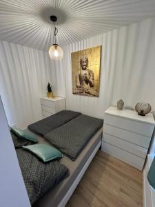 Postel nebo postele na pokoji v ubytování Cozy 1-Bedroom Condo