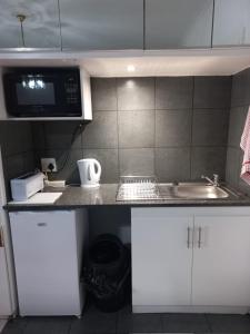 Kuchyň nebo kuchyňský kout v ubytování Canberra on Greenwood