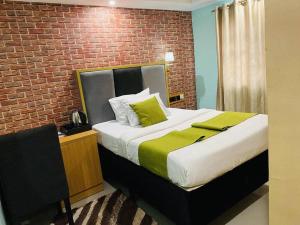 Postel nebo postele na pokoji v ubytování Shamrockmanor(TheResidence)