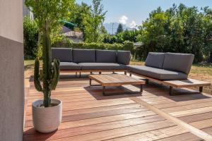 Zahrada ubytování Appartement chaleureux à Sévrier