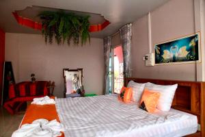 Giường trong phòng chung tại Heaven Guesthouse