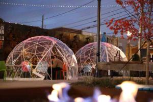 three domes in a park with people in them at The Music Booth - walk to restaurants and bars in Chattanooga