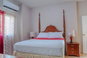 Letto o letti in una camera di Savan Suite - Caribbean Estates - Gated Community