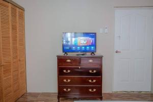 TV o dispositivi per l'intrattenimento presso Savan Suite - Caribbean Estates - Gated Community