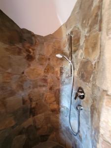 a shower in a stone wall at Berry in Klatovy