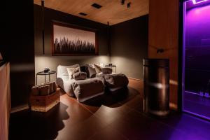 Ένα ή περισσότερα κρεβάτια σε δωμάτιο στο Snow Villa Genf Spa - Relax