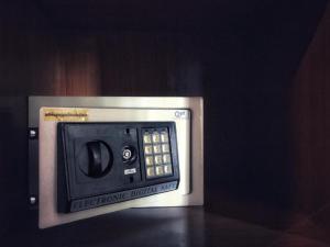 a microwave oven sitting on top of a table at Momo Hotel in Chiang Mai