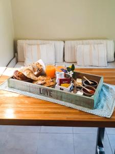 a tray of food on top of a table at Amapola Tiny House in San Carlos de Bariloche