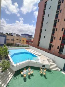 a swimming pool on the roof of a building at Gree Hotel in São Luís