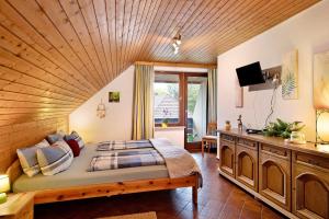 Ένα ή περισσότερα κρεβάτια σε δωμάτιο στο Landhaus Am Schmiedebach