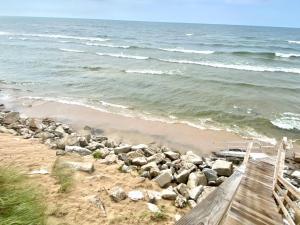 a boardwalk on the beach near the ocean at Indoor Pool near Grand Haven with Lake Michigan Beach! in Norton Shores