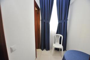 Posezení v ubytování Hotel Tres Leones