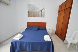 Postel nebo postele na pokoji v ubytování Hotel Tres Leones