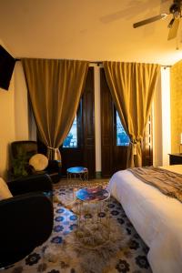 Giường trong phòng chung tại Luxury Macabeo 25
