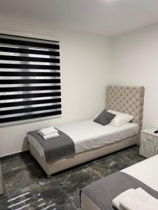 Posteľ alebo postele v izbe v ubytovaní Apartmani River Priboj