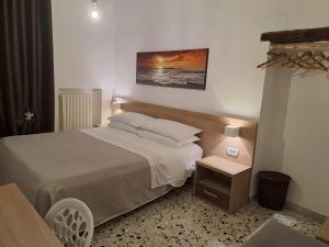 Postel nebo postele na pokoji v ubytování B&By in viaggio