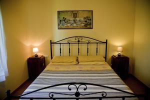 A bed or beds in a room at Agriturismo Tenuta Sol Alto