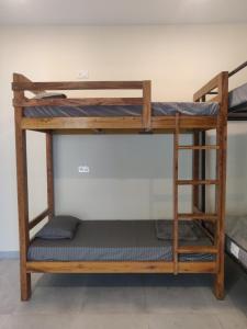 Letto o letti a castello in una camera di Tavāsmi
