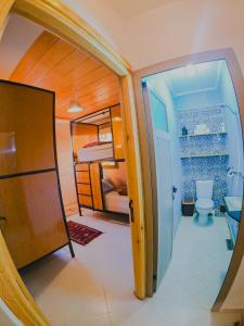 Cama o camas de una habitación en Atlantic Vibes Surf Hostel