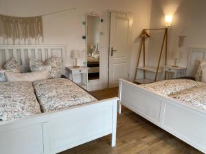 Postel nebo postele na pokoji v ubytování Gästehaus Brigitte Duri