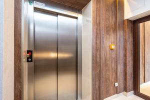 a stainless steel elevator in a room at Hotel i Restauracja Stara Kuźnia in Dobczyce +23 photos
