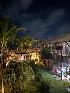 an aerial view of a resort at night at Taíba Beach Resort Surf House in Taíba