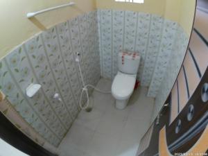 a model of a bathroom with a toilet at Hotel Rongdhanu Residential in Dhaka