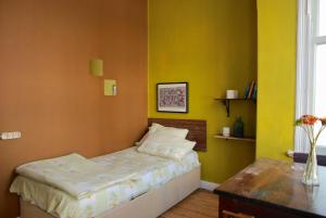 A bed or beds in a room at Jumba Hostel