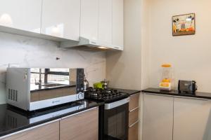 A cozinha ou kitchenette de Sky Suites - Fantastic Apt in the heart of La Paz