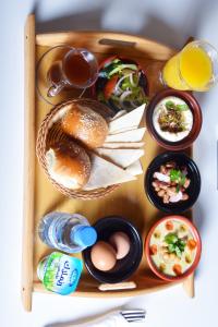 a miniature model of a lunch box with food on it at Sabah Resort Nouakchott in Nouakchott +23 photos