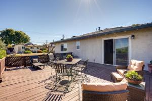 a wooden deck with a table and chairs on it at Vallejo Vacation Rental Close to Wine and Outdoors in Vallejo