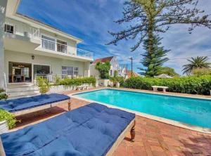 The swimming pool at or close to Fresnaye Family Home with Ocean Views