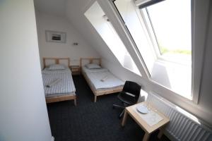 Postel nebo postele na pokoji v ubytování Ubytování Tři Vrby