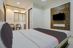 Posteľ alebo postele v izbe v ubytovaní Hotel Krishna Inn