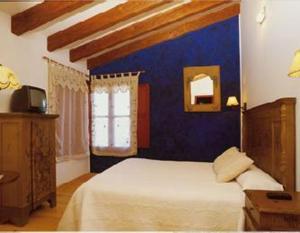 Postel nebo postele na pokoji v ubytování Posada Real La Mula de los Arribes + 37 fotografií
