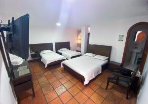 Hotel Zaraya客房内的一张或多张床位