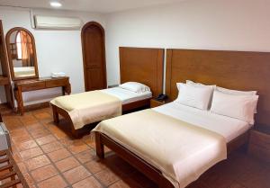 Hotel Zaraya客房内的一张或多张床位
