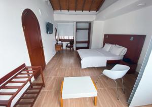 Hotel Zaraya客房内的一张或多张床位