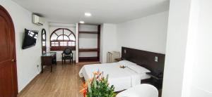Hotel Zaraya客房内的一张或多张床位
