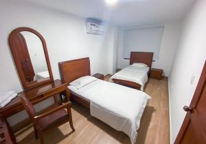 Hotel Zaraya客房内的一张或多张床位