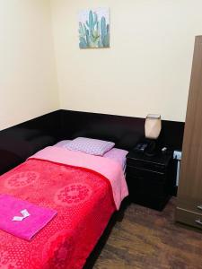 Postel nebo postele na pokoji v ubytování KORICANCHA