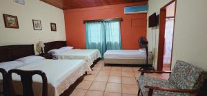 Letto o letti in una camera di Hotel Alsacia