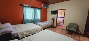 Letto o letti in una camera di Hotel Alsacia
