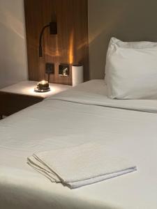 Katil atau katil-katil dalam bilik di Guided Hospitality - Luxury Accommodations
