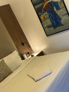 Katil atau katil-katil dalam bilik di Guided Hospitality - Luxury Accommodations