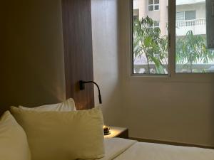 Katil atau katil-katil dalam bilik di Guided Hospitality - Luxury Accommodations