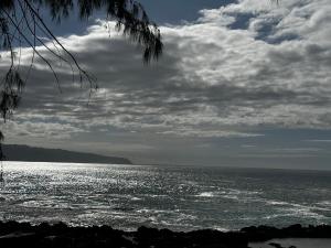 a view of the ocean under a cloudy sky at Amazing Ocean View! in Haleiwa