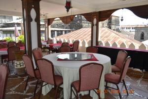 Veitingastaður eða matsölustaður á Al-Minar Hotel