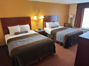 Voodi või voodid majutusasutuse Americas Best Value Inn Saint Robert/Fort Leonard Wood toas